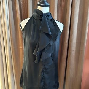 Essentials size M black sleeveless blouse.